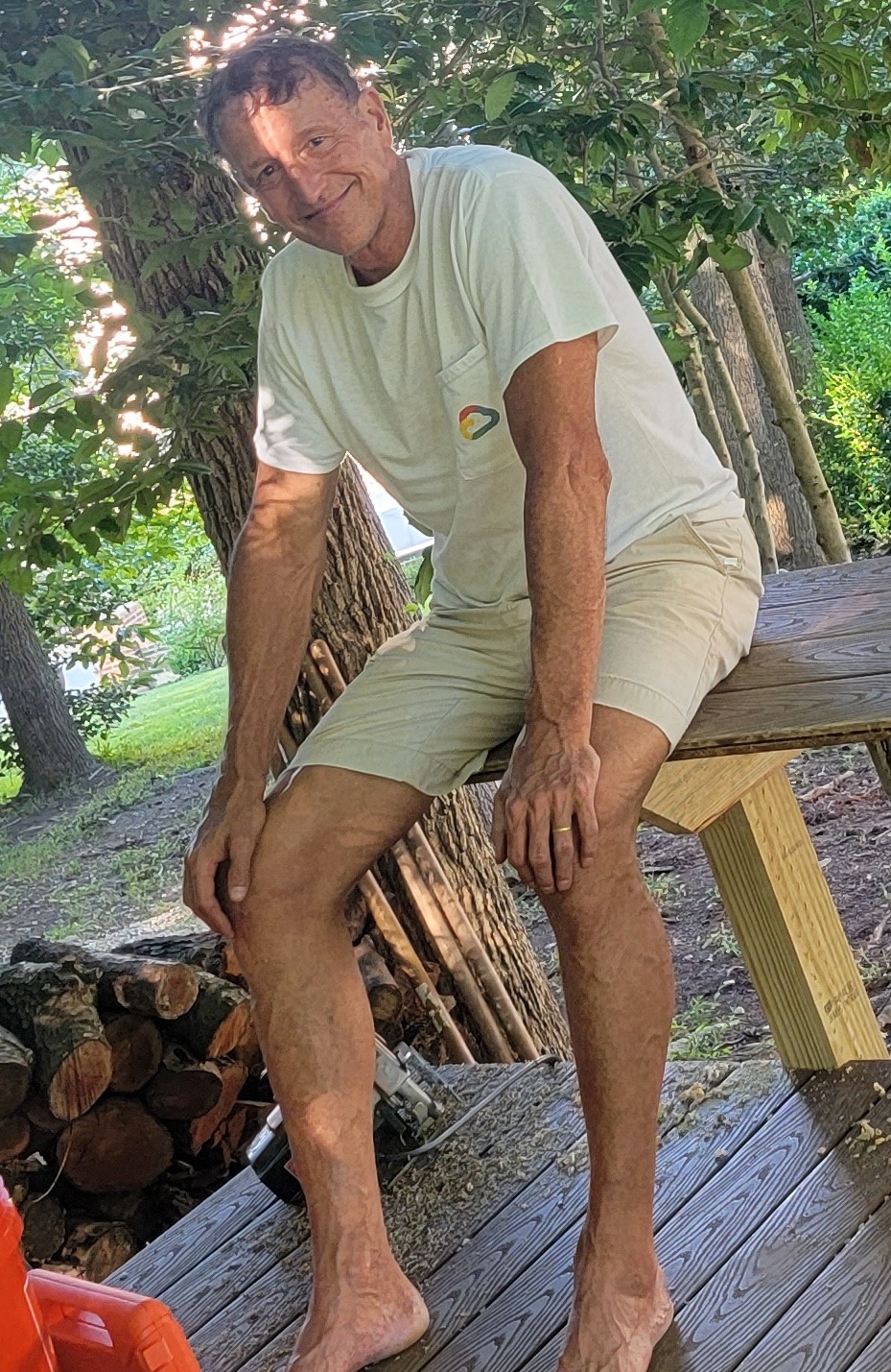 sitting on the deck that he just built